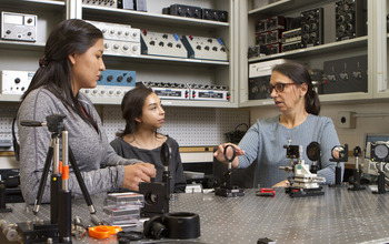 Fort Lewis College engineering students work in the laboratory with Megan Paciaroni.